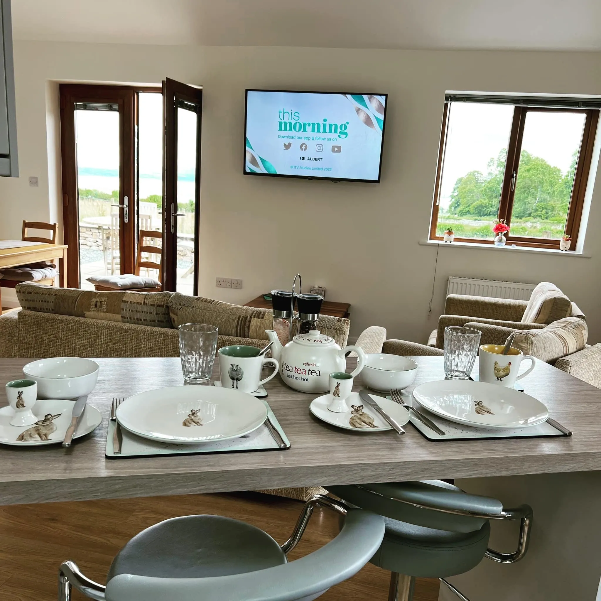 Breakfast laid out in Little Barn's open-plan dining and living space