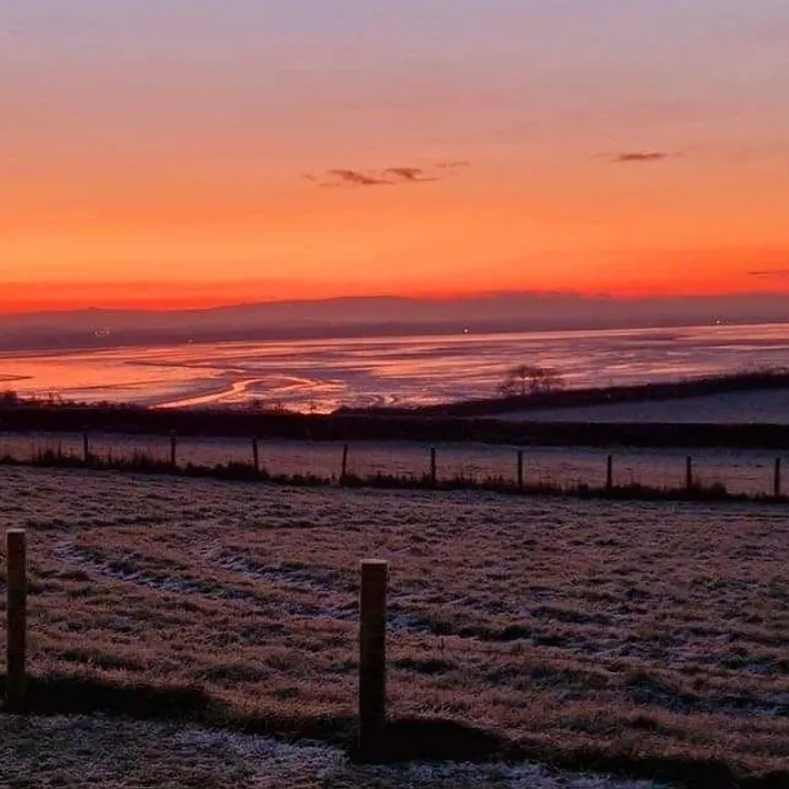 A vivid winter sunset over Morecambe Bay